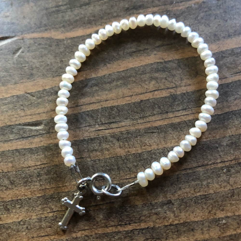 Newborn girls cross pearl bracelet